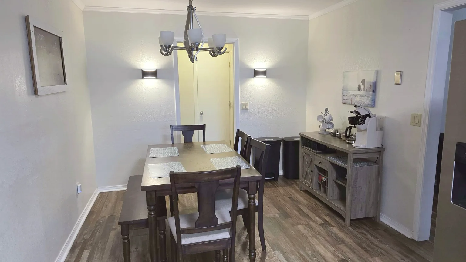 Dining area at The Space Place with table seating and a coffee station