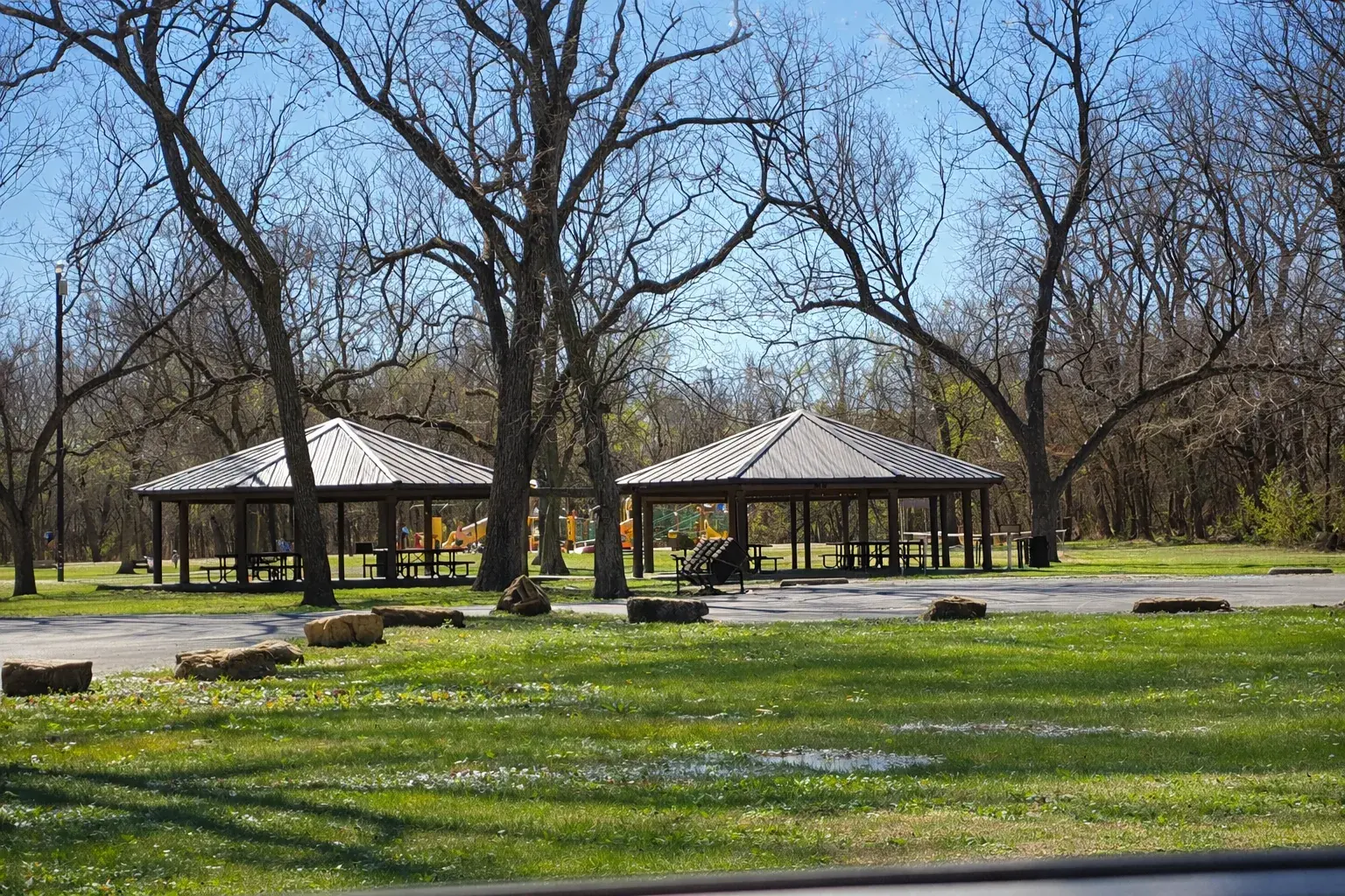 Open field and tree-lined trail area at Haikey Creek Park