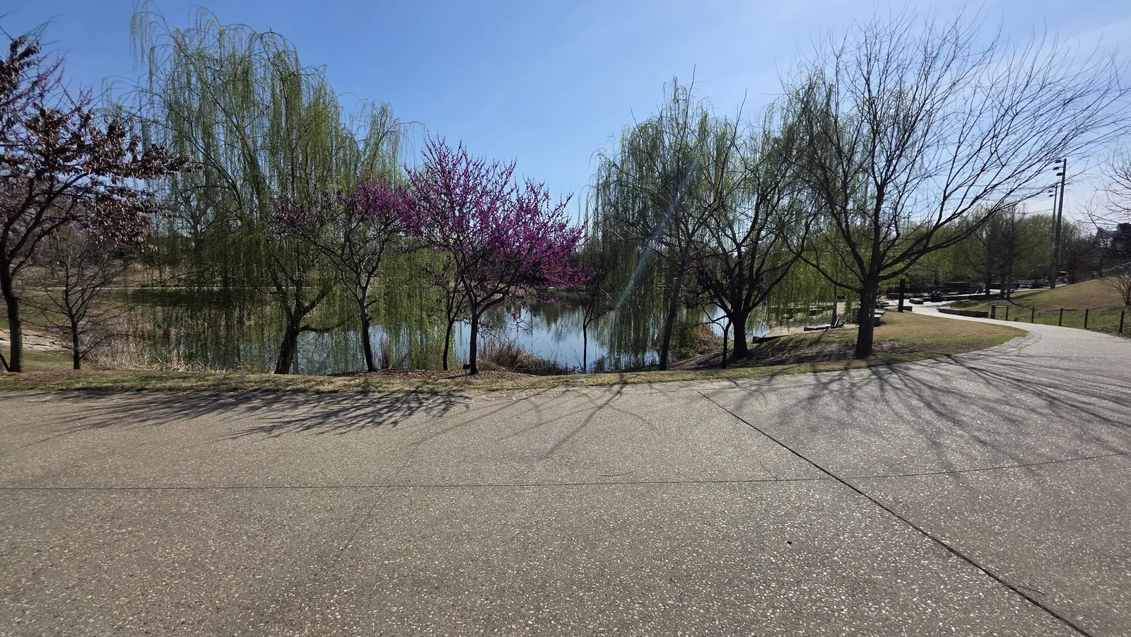 Paved lakeside path at Gathering Place in Tulsa